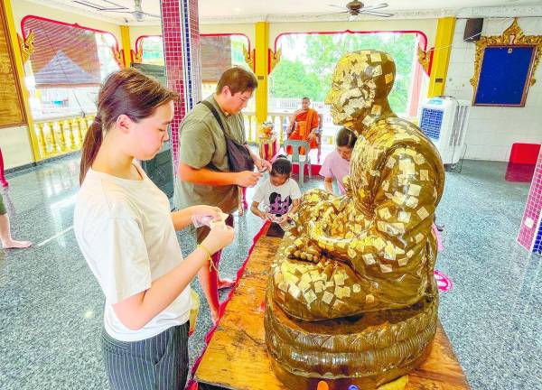 Preparations were also in full swing for Wesak Day celebrations at the Thai Buddhist Chetawan Temple in Jalan Gasing, Petaling Jaya. – AMIRUL SYAFIQ/THESUN