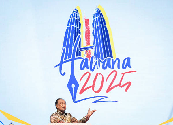 Prime Minister Datuk Seri Anwar Ibrahim during his speech when officiating the National Journalists’ Day (HAWANA) 2025 celebration at the World Trade Centre Kuala Lumpur (WTCKL) today. - BERNAMApix
