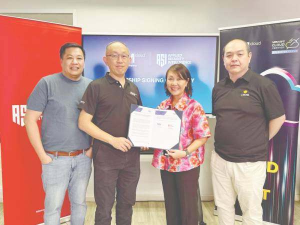 From left: AVM Cloud chief technology officer Lai Eong Hua, Lim, ASI Sdn Bhd general manager Chee Anne, and LGMS Bhd executive chairman Fong Choong Fook.