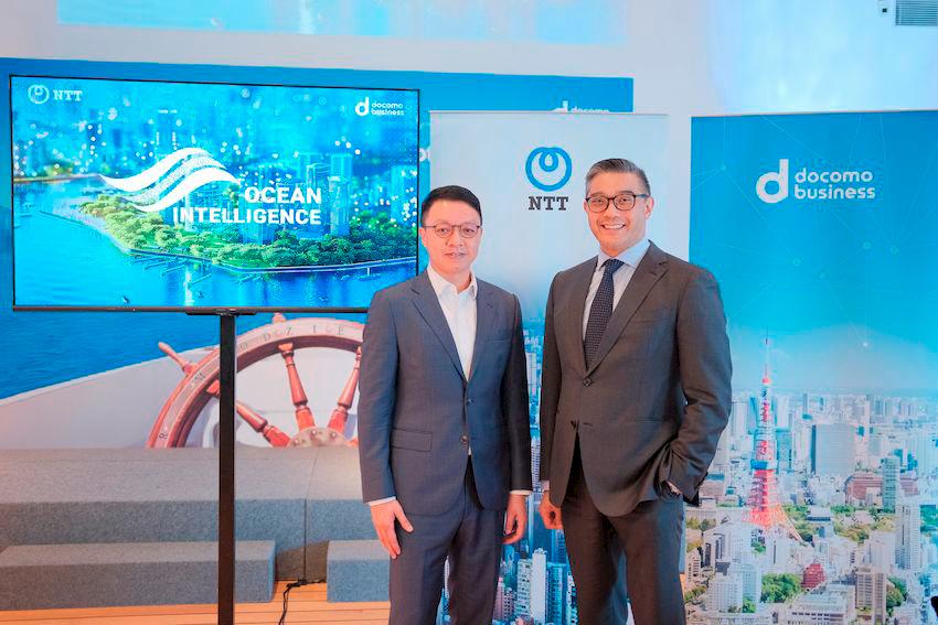 The photo features Steven So, Senior Vice President, NTT Com Asia (left) and Stephen Tsang, Chief Revenue Officer, NTT Com Asia (right).