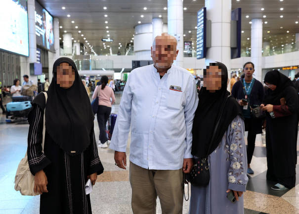 Three out of 49 elderly Malaysian haj pilgrims who were defrauded by a local haj agent, masterminded by a well-known religious scholar, safely returned to Malaysia via Turkish Airlines flight TK60. They were met at Kuala Lumpur International Airport (KLIA) Terminal 1 today. - BERNAMApix