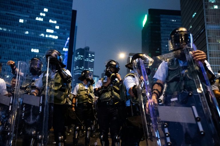 Anger soared in Hong Kong following the attacks by suspected gangsters that left dozens wounded. — AFP