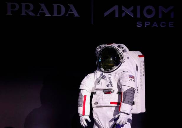 Prada and Axiom Space present the spacesuit (Axiom Extravehicular Mobility Unit) designed and developed for the Artemis III lunar mission, in Milan, Italy, October 16, 2024. - REUTERS/Claudia Greco