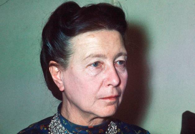 (FILES) In this file photo taken on June 1970 French writer Simone de Beauvoir looks on in Paris. / AFP / STF