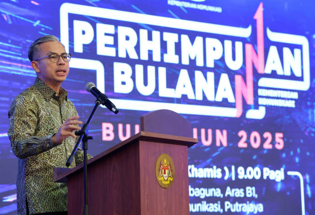Communications Minister Datuk Fahmi Fadzil at the ministry’s monthly assembly at Menara Komunikasi here today. - BERNAMApix