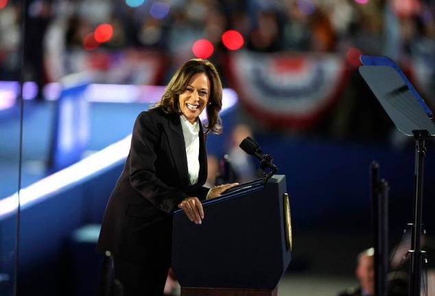 WASHINGTON, DC - OCTOBER 29: Democratic presidential nominee U.S. Vice President Kamala Harris smiles as she speaks during a campaign rally on the Ellipse on October 29, 2024 in Washington, DC. With one week remaining before Election Day, Harris delivered her “closing argument,” a speech where she outlined her plan for America and urged voters to “turn the page” on Republican presidential nominee, former U.S. President Donald Trump. - Tasos Katopodis/Getty Images/AFP