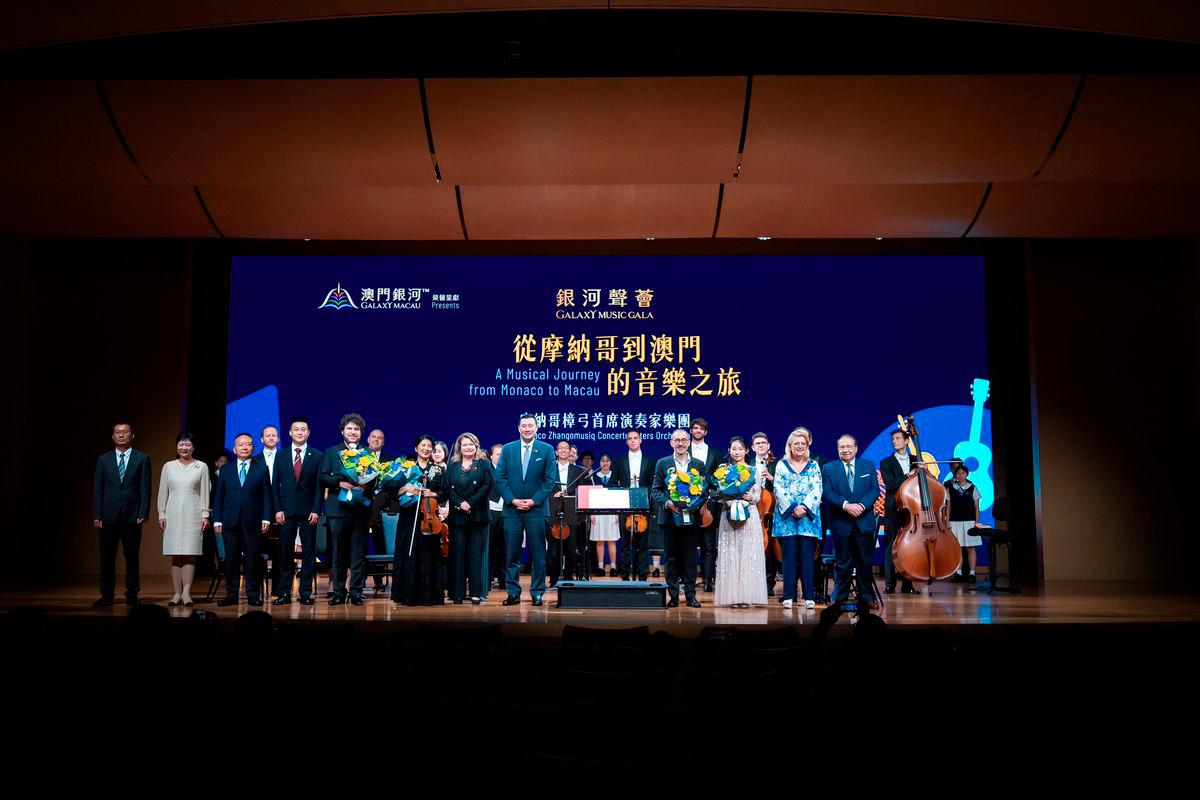 $!Mr. Troy Hickox, Head of Hotels &amp; Lifestyle Development of Galaxy Entertainment Group (“GEG”), Director of Monte Carlo Societé des Bains de Mer (SBM), following his introductory address, standing on stage next to H.E. Ms. Marie-Pascale BOISSON.