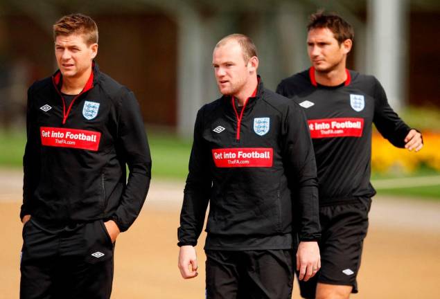 London Colney - 9/8/10 England’s Steven Gerrard (L), Wayne Rooney (C) and Frank Lampard during training. Action Images / John Sibley Livepic/File Photo
