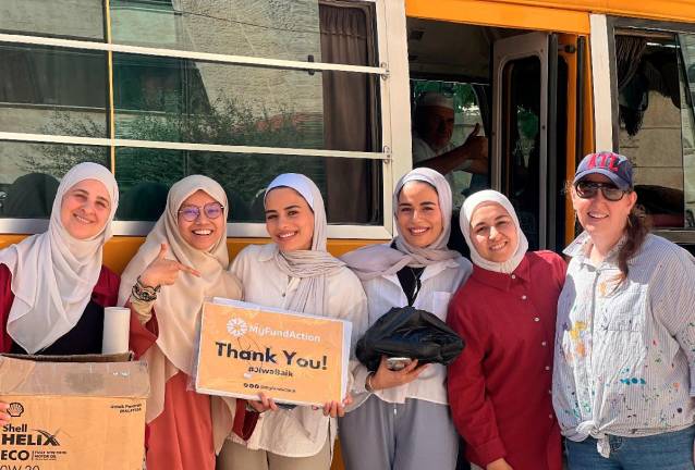 Malaysian students along with YOSH Jordan volunteers at the Mafraq refugee camp in Jordan. - Pic courtesy MyFundAction