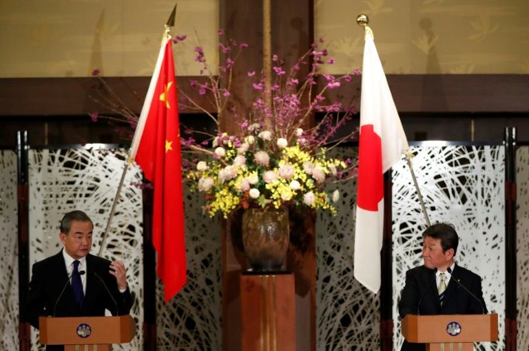 China’s State Councillor and Foreign Minister Wang Yi (left) and his Japanese counterpart Toshimitsu Motegi held talks in Tokyo. — AFP