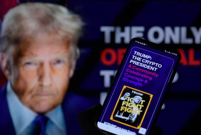 US President Donald Trump launched a volatile crypto token just days before taking office. Trump reported $57.35 million from token sales at crypto firm World Liberty Financial.AFPpix