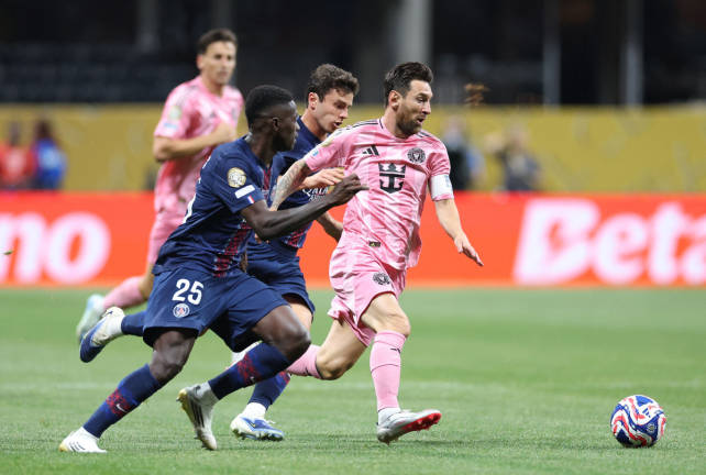 Inter Miami’s Argentine forward #10 Lionel Messi, Paris Saint-Germain’s Portuguese defender #25 Nuno Mendes and Portuguese midfielder #87 Joao Pedro Goncalves Neves fight for the ball during the FIFA Club World Cup 2025 round of 16 football match between France’s Paris Saint-Germain and US Inter Miami at the Mercedes-Benz Stadium in Atlanta on June 29, 2025. - AFP