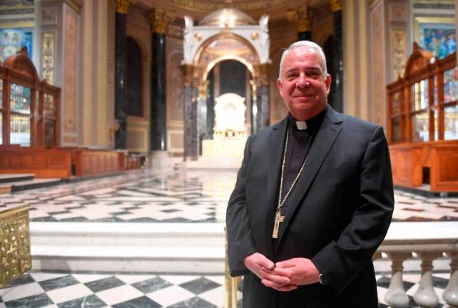 Archbishop of Philadelphia Nelson J. Perez poses for a portrait inside of The Cathedral Basilica of Saints Peter and Paul in Philadelphia, Pennsylvania on May 8, 2025. AFPpix