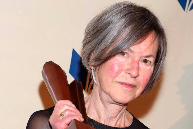 FILES) This file photo taken on November 19, 2014 shows Louise Gluck attending the 2014 National Book Awards in New York City. The Nobel Literature Prize went Thursday, October 8, 2020 to American poet Louise Gluck, the jury at the Swedish Academy said. Gluck was honoured “for her unmistakable poetic voice that with austere beauty makes individual existence universal,“ the Academy said. / AFP / GETTY IMAGES NORTH AMERICA / Robin Marchant / ALTERNATIVE CROP