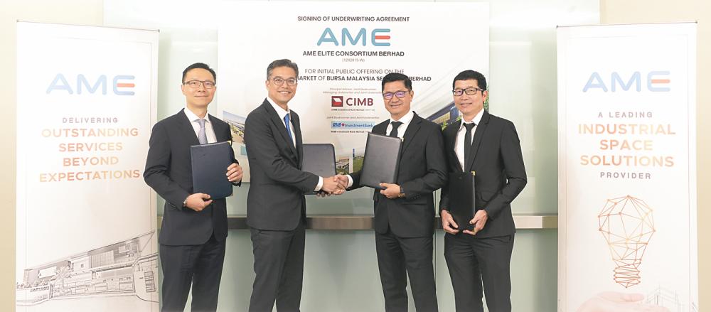 From left: RHB Investment Bank executive director and head of capital markets Jaimie Sia Zui Keng, CIMB Investment Bank CEO Jeffri M Hashim, AME Elite Consortium group managing director Kelvin Lee Chai and executive director Simon Lee Sai Boon at the underwriting agreement signing ceremony recently.