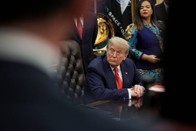 U.S. President Donald Trump attends a meeting with Democratic Republic of the Congo’s Foreign Minister Therese Kayikwamba Wagner and Rwanda’s Foreign Minister Olivier Nduhungirehe (not pictured) in the Oval Office at the White House in Washington D.C., June 27, 2025. - REUTERS