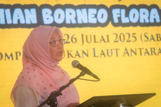Minister in the Prime Minister’s Department (Federal Territories) Datuk Seri Dr Zaliha Mustafa addressing keynote speech at the official launching of the Borneo Flora Festival 2025 (BFF) yesterday. - Bernama pic