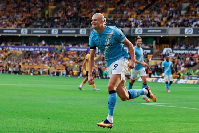 Manchester City’s striker Erling Haaland celebrates scoring their third goal during the English Premier League football match between Wolverhampton Wanderers and Manchester City at the Molineux stadium in Wolverhampton. - AFP pic