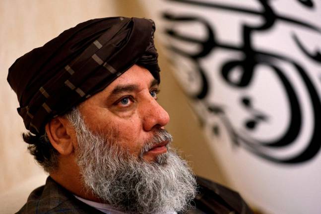 Taliban’s acting commerce minister Haji Nooruddin Azizi speaks during an interview with Reuters, at the Embassy of Afghanistan in Beijing, China October 19, 2023. - REUTERSpix