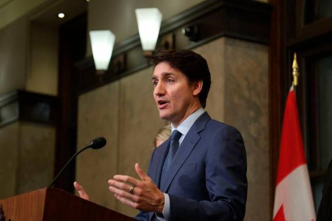 Canada’s Prime Minister Justin Trudeau speaks during a news conference about the US tariffs against Canada on March 4, 2025 on Parliament Hill in Ottawa. AFP Pix