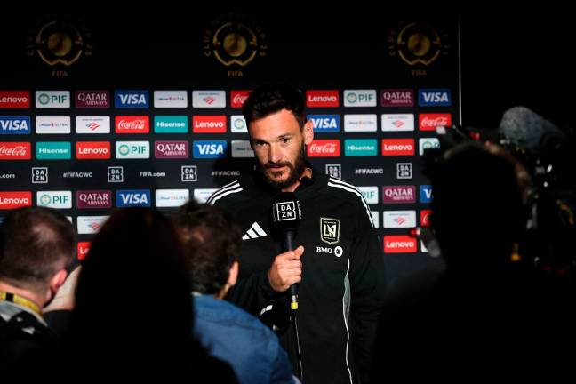 Hugo Lloris #1 of LAFC talks to the media during the Training/Press Conference ahead of their FIFA Club World Cup 2025 Group D match between Los Angeles Football Club and Chelsea FC at Mercedes-Benz Stadium on June 15, 2025 in Atlanta, Georgia. - Alex Grimm/Getty Images/AFP