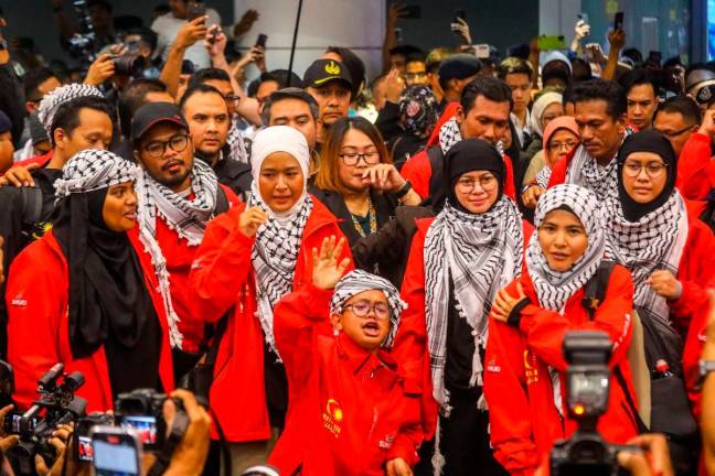 Malaysian women activists from the Global Sumud Flotilla arriving at KLIA, greeted by supporters and family members after their release from Israeli detention and safe return home. ADAM AMIR HAMZAH THESUN
