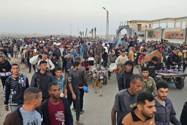 Displaced Palestinians return from a food distribution centre in Rafah in the southern Gaza Strip on June 1, 2025. - AFPpix