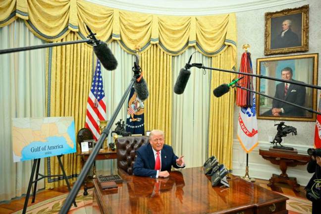 Donald Trump promised a new “Golden Age” for America. In the Oval Office, at least, he has lived up to his promise with a blingy makeover. The Republican has decked out the inner sanctum of the US presidency with gilded trophies and gold-plated, Trump-branded coasters, and filled almost every available inch of wall space with portraits of his predecessors. AFPpix