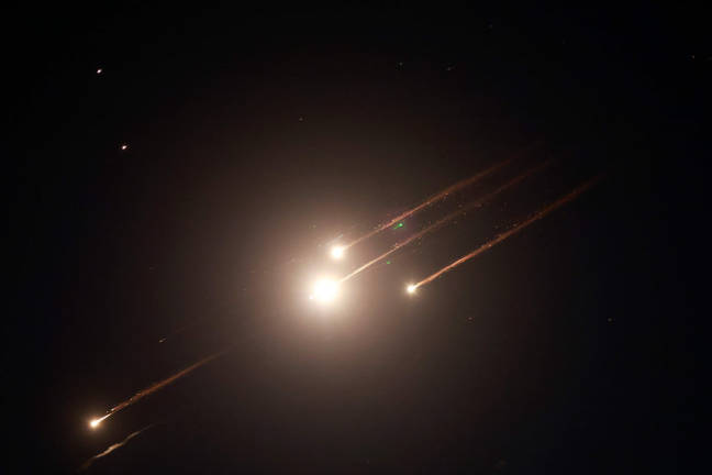 This picture shows rocket trails in the sky above Jerusalem on June 13, 2025. Air raid sirens sounded in Jerusalem and loud blasts were heard on June 13, AFP journalists reported, as the Israeli military said it had detected a missile launched from Iran. - AFPpix