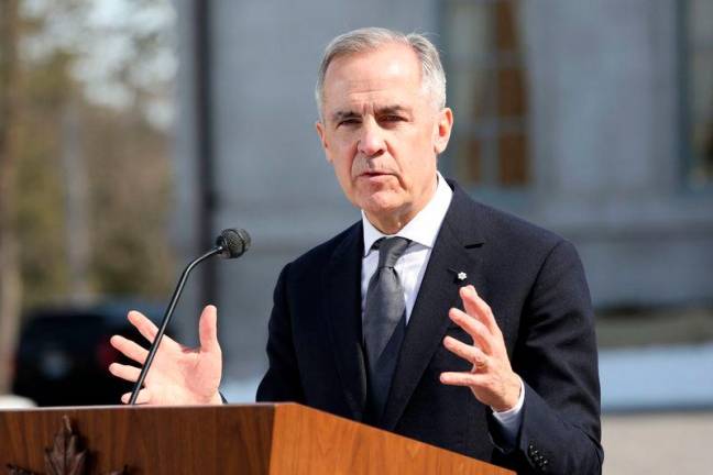 Canada’s Prime Minister Mark Carney speaks during a news conference at Rideau Hall for after a swearing in ceremony on March 14, 2025 in Ottawa. AFPpix