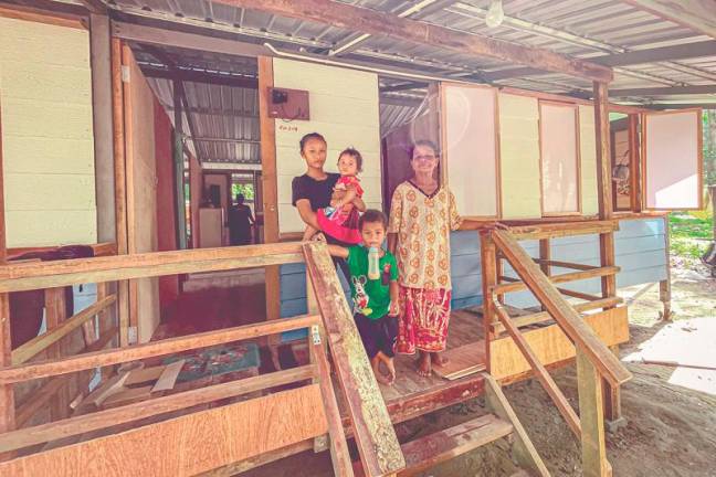 Many families live in simple dwellings, lacking basic amenities like clean water and electricity. - ADIB RAWI YAHYA/THESUNpix