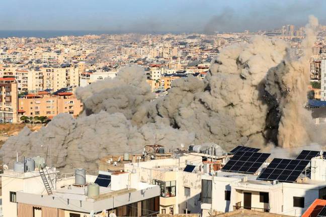 Thick smoke rises from an explosion during an Israeli airstrike that targeted a neighbourhood in Beirut’s southern suburbs on November 17, 2024, amid the ongoing war between Israel and Hezbollah. An Israeli strike hit south Beirut on November 17 where the military said it targeted Hezbollah, hours after the Iran-backed group said it fired on Israeli bases around the city of Haifa. - AFPpix