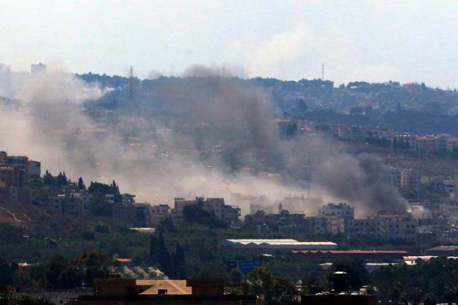 Smoke billows from the site of an Israeli air raid in the southern Lebanese town of Ghaziyeh on September 23, 2024. The Israeli military on September 23 told people in Lebanon to move away from Hezbollah targets and vowed to carry out more “extensive and precise” strikes against the Iran-backed group. - AFPpix