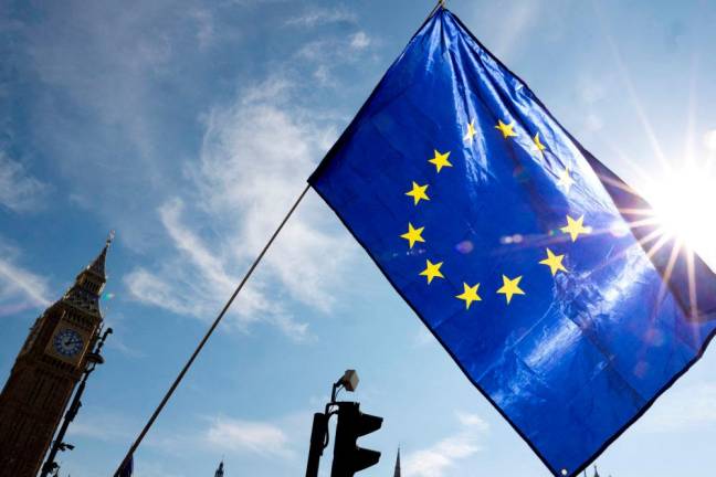 The European union flag is seen next to The The Elizabeth Tower, commonly known as Big Ben in London, Britain. REUTERSpix