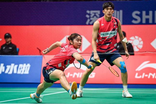 National mixed doubles pair, Hoo Pang Ron and Cheng Su Yin (L). - AFPpix