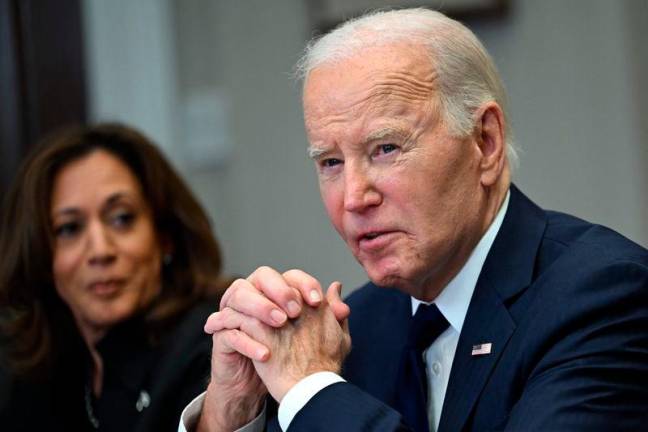 US Vice President Kamala Harris listens to US President Joe Biden speak about the Los Angeles fires in the Roosevelt Room of the White House in Washington, DC, on January 9, 2025. AFPpix