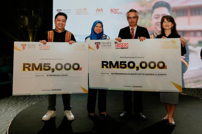 From left: Lucas, Fadzliaton, Muhammad Hamka and Tan during the RISE Educator Award 2025 ceremony.