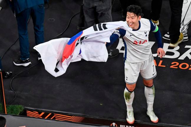 Tottenham Hotspur’s South Korean forward #07 Son Heung-Min celebrates after the UEFA Europa League final football match between Tottenham Hotspur and Manchester United at the San Mames stadium in Bilbao on May 21, 2025. - AFPpix