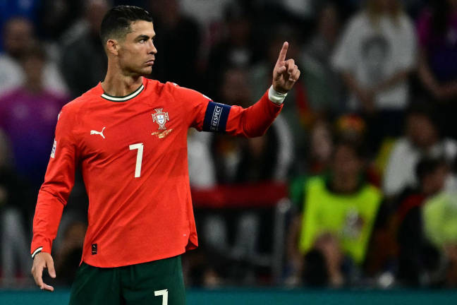 Portugal’s forward #07 Cristiano Ronaldo reacts during the UEFA Nations League semi-final football match between Germany and Portugal in Munich, southern Germany on June 4, 2025. - AFPpix