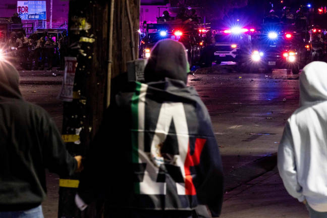 Sheriff deputies face off with demonstrators during a protest following federal immigration operations, in the Compton neighborhood of Los Angeles, California on June 7, 2025. - AFPpix