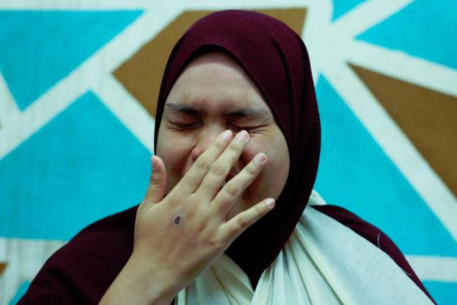 UPSI crash survivor Nur Ain Najwa breaks down at distant rumble of bus engine