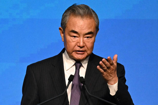 China’s Foreign Minister Wang Yi speaks at the signing ceremony of the Convention on the Establishment of the International Organization for Mediation Convention (IOMed) in Hong Kong on May 30, 2025. - AFPpix