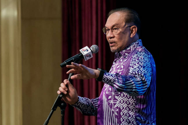 Prime Minister Datuk Seri Anwar Ibrahim spoke at the Prime Minister’s Monthly Assembly with the Prime Minister’s Department (JPM) staff for May 2025 at Dewan De Seri Endon, PUSPANITAPURI today. - BERNAMApix