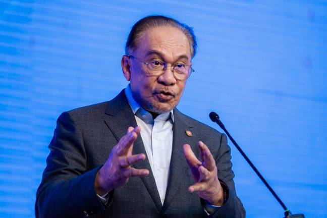 Prime Minister Datuk Seri Anwar Ibrahim speaking during the Permodalan Nasional Berhad Knowledge Forum 2025. - Bernama pic