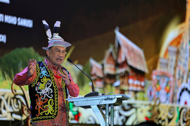 Prime Minister Datuk Seri Anwar Ibrahim delivered a speech at the 2025 Sarawak-level Gawai Day Celebration Dinner at the Borneo Convention Centre Kuching last night. - BERNAMA
