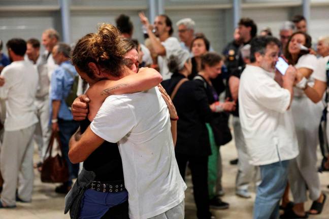 For representational purposes only: One of the Spanish activists who was part of the Global Sumud Flotilla and was detained by Israeli forces, hugs a person upon arrival at Adolfo Suarez Madrid-Barajas Airport in Madrid, Spain, October 5, 2025. REUTERS/Juan Medina