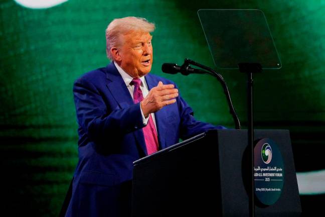 U.S. President Donald Trump attends the Saudi-U.S. Investment Forum, in Riyadh, Saudi Arabia, May 13, 2025. REUTERS/Brian Snyder
