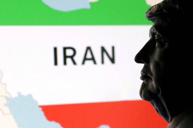 3D printed miniature of U.S. President Donald Trump’s face and map of Iran are seen in this illustration taken June 23, 2025. - REUTERS