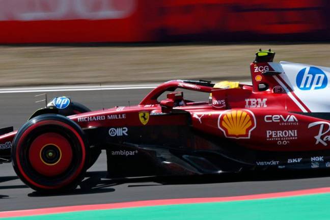 Ferrari’s British driver Lewis Hamilton drives during the first practice session of the Formula One Chinese Grand Prix at the Shanghai International Circuit in Shanghai on March 21, 2025. - GREG BAKER / AFP