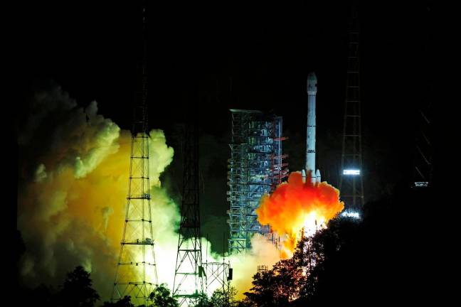 A Long March-3B Y110 rocket carrying Tianwen-2 probe takes off from the Xichang Satellite Launch Center in Sichuan province, China May 29, 2025. - China Daily via REUTERS